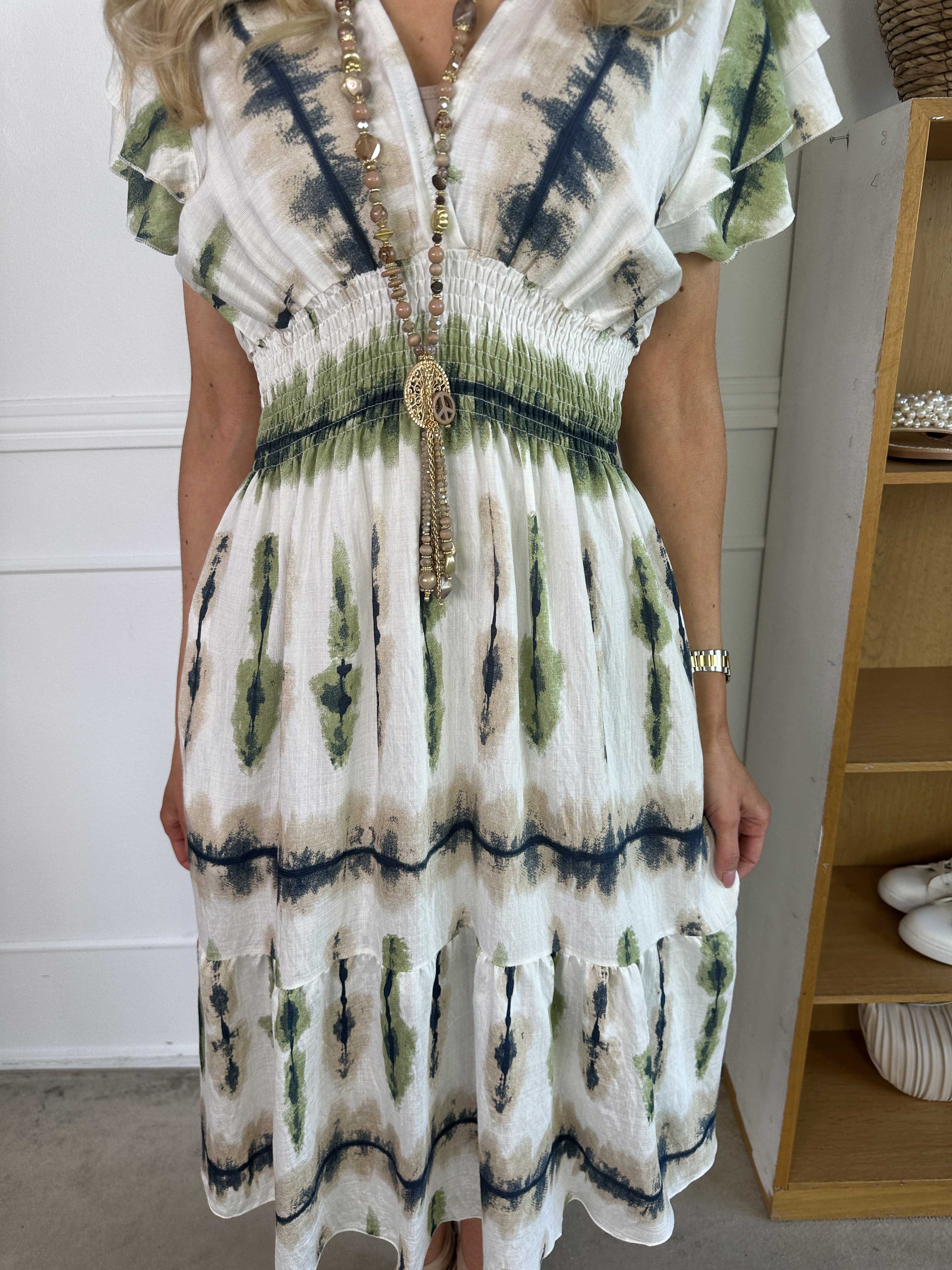 Niko - Söt klänning i viskos med smock under bröstet och fickor